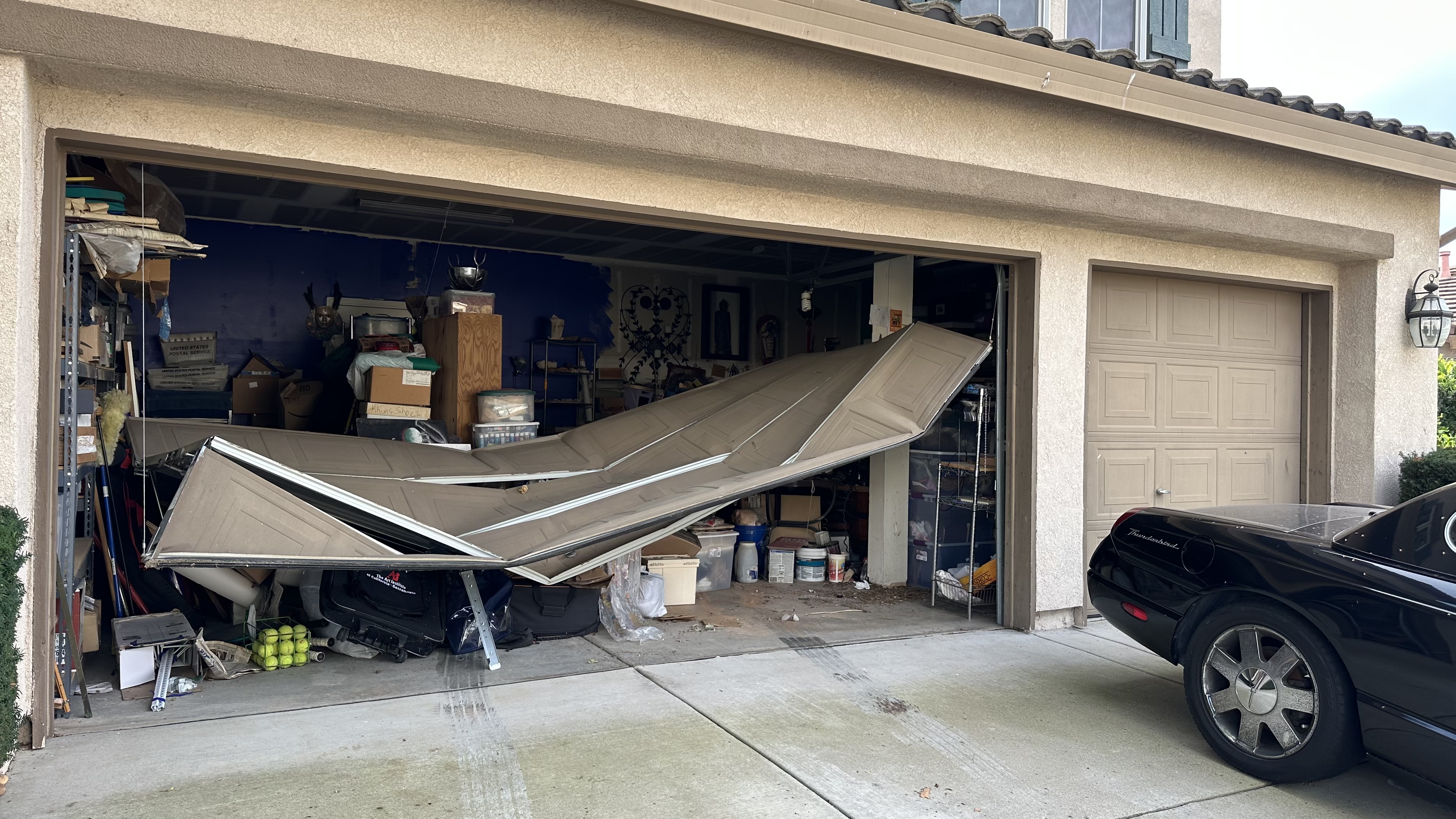 Crashed garage door repair project